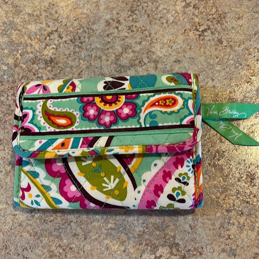Vera Bradley wallet. Light green with pink flowers. Good condition
